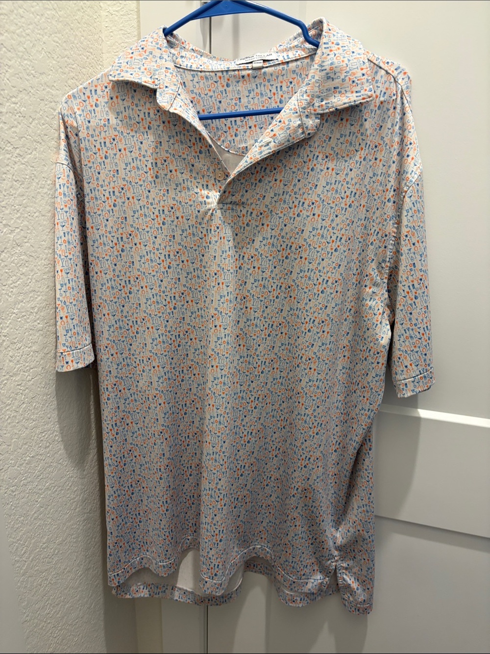 Men's Peter Millar Golf Polo Size LargeCarlton Woods logo ,Blue & Orange print